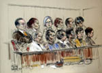 The twelve jurors listening to evidence